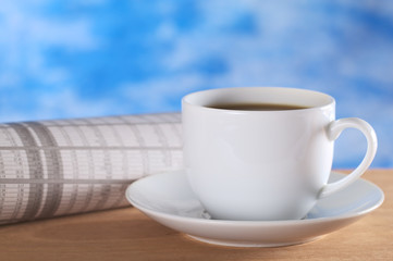 Hot coffee with newspaper (stock market section)