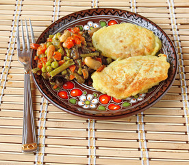 Lean potato pancakes with the extinguished green-stuffs