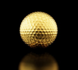 gold golf ball on black background