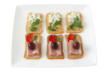 Toasts with ham and cucumber dip