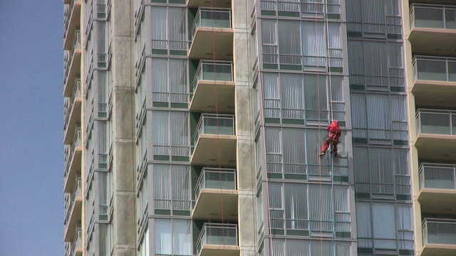 Window Washer in Red Suit