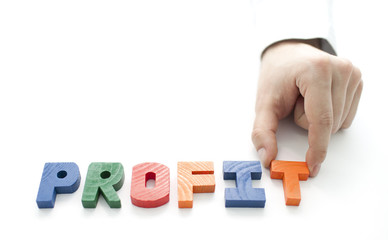 Hand and word Profit on white background