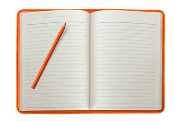orange notebook with a pencil