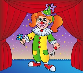 Clown girl on circus stage 1