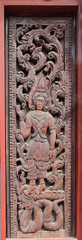 Decorated wooden beside door