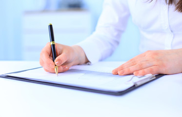 Business woman working with documents in the office