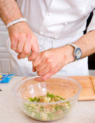 Chef preparing salad