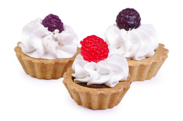 Delicious cakes in baskets