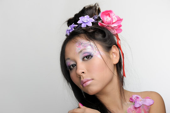 Close-up portrait of asian girl with make-up