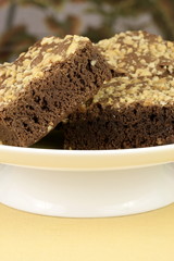 chocolate brownies with cracked peanuts on top