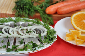 Appetizing herring with onions and oranges