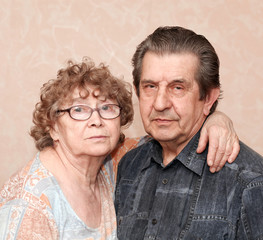 family portrait of great elderly people hugging