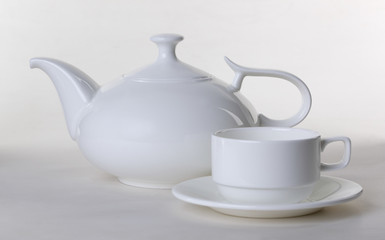 White teapot with a mug