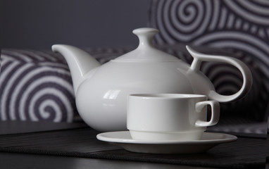 White teapot with a mug