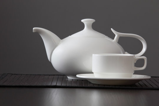 White teapot with a mug