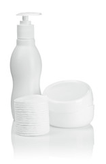 cotton pads bottle and cream