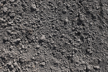 Cultivated gray dried soil, nature background
