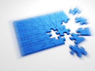 Motion blurred image of collecting puzzle