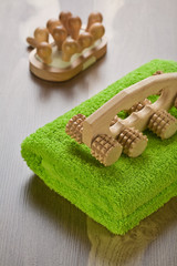 green towel with massager