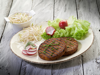 vegetarian hamburger with soy sprout radish and salad