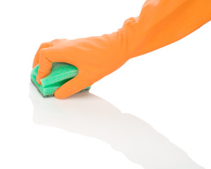 hand in orange glove with sponge