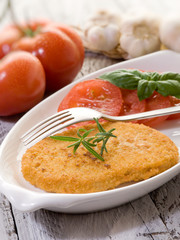 vegetarian cutlet with slice tomatoes-cotoletta vegetariana