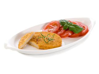slice vegetarian cutlet with slice tomatoes