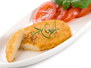 slice vegetarian cutlet with slice tomatoes