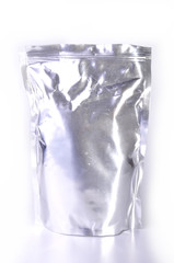 Aluminum foil package isolates on white background.