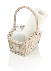 paper towel and bottle in basket