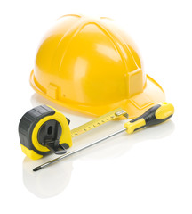 screwdriver, tapeline and helmet