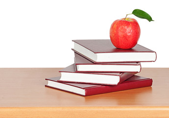 Red apple on book
