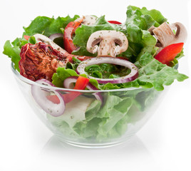 Salad with dried tomatoes, champignon and onion.