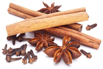Cloves, anise and cinnamon isolated on white background.