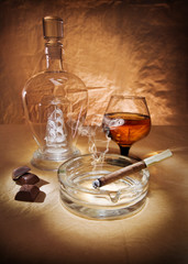 still life with cigar and cognac