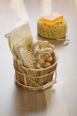 wooden bucket and bath sponge with soap