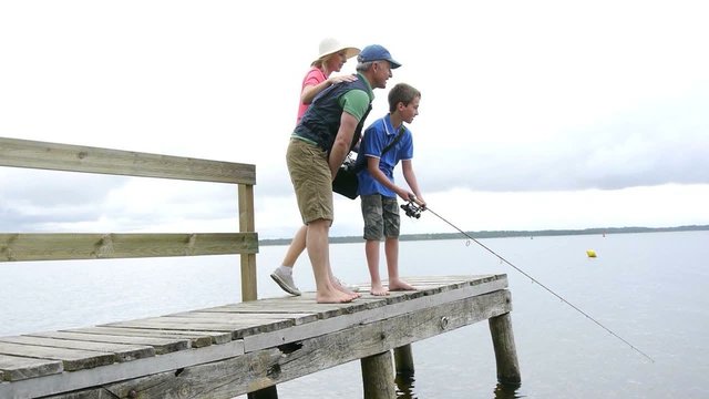 Family fishing on a pontoon