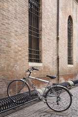 Old  Bicycle leaning on a Wall  in Itali