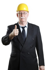 Business person with hardhat giving thumbs up