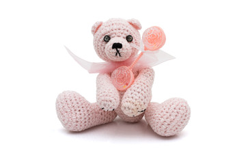 Cute homemade teddy bear with baby rattle