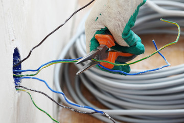 worker puts the wires