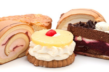 variety of cake on a white background