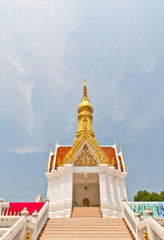 Temple golden roof and red, white building