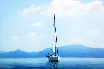 yacht and blue water ocean
