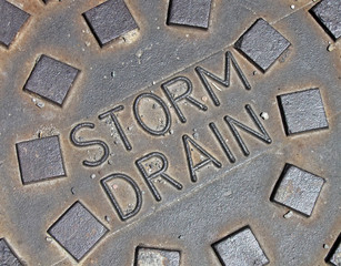 storm drain, vintage rain water manhole closeup,, street rain utilization diversity, rust street...
