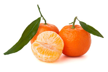 Ripe tangerines with green leaf