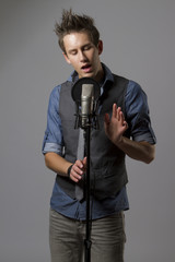 Handsome male is singing