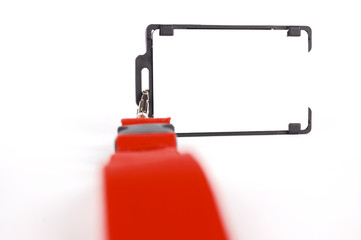 badge with a red ribbon