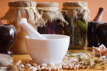 Mortar with herbs in larder