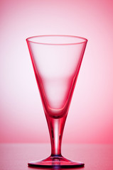 Wine glasses against gradient background